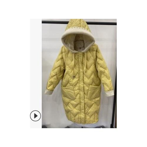 The new 2020 medium and long womens white duck down down jacket is casual, loose, fashionable and contrasting color with a hood