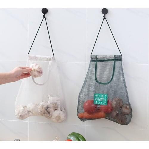 Multifunctional wall-mounted kitchen fruit and vegetable storage hanging bag portable ginger garlic onion hollow mesh bag