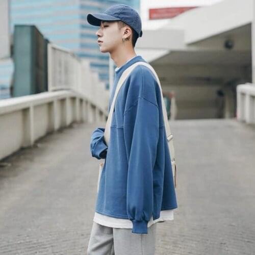 Spring and Autumn Winter Korean version of the pure color tide mens sweater fake two thin section youth sports ulzzang lovers