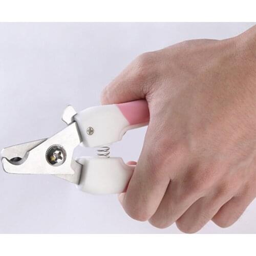 Dog Nail Clippers and Trimmer with Safety Guard to Avoid Over-Cutting Nails & Free Nail File - Razor Sharp Blades - Sturdy Non S