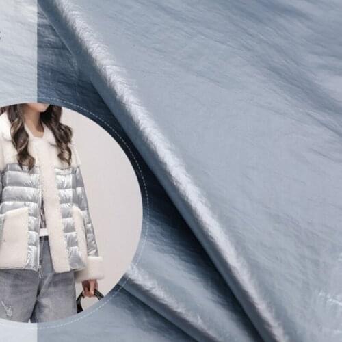 Roll wholesale 380t taffeta bright down jacket fabric Metallic bright PU waterproof Cotton clothing nylon windbreaker cloth