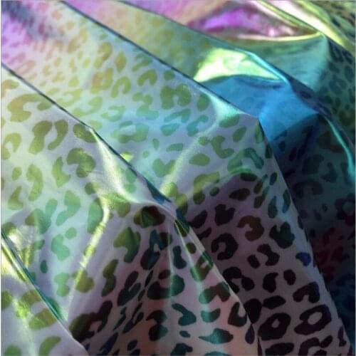 100% polyester waterproof fabric laser seven color leopard print hot gold cloth DIY sewing material by the meter