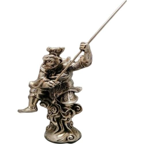 White bronze statue of Buddha, Monkey King, fighting against the statue of Buddha, bronze monkey ornament