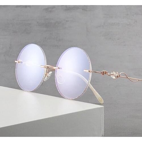 Women New Fashion Elegant Crystal Anti Blu Ray Ultralight Oversized Rimless Round Designer Glasses Frame Eyeglasses