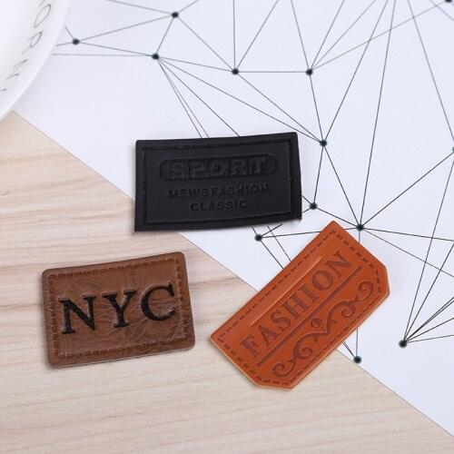 Custom PU labels hot sale jeans brand logo embossed leather patches labels for clothing bags