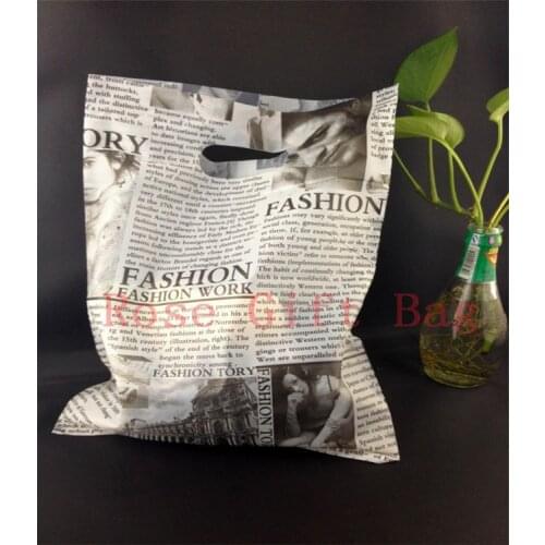 50pcs/lot Black Newspaper Design Plastic Gift Bag 25x35cm Clothes Jewelry Packaging Bag Big Plastic Shopping Bags With Handle