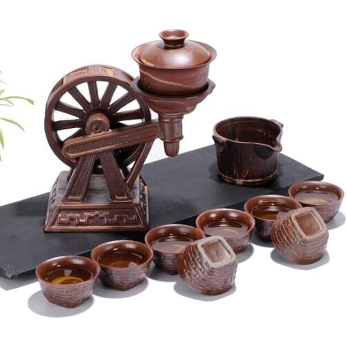 Creative Antique water biker automatic Kongfu tea Sets imitation cork shape high-grade coarse pottery tea set wholesale