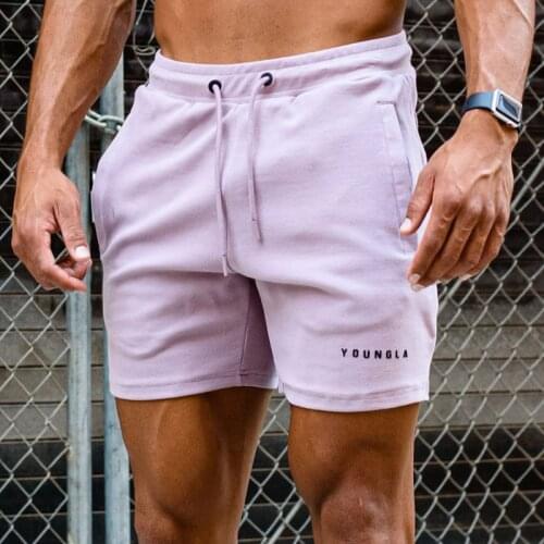 2021 summer new muscle fitness brothers mens sports fitness casual shorts running squat sweat-absorbent cotton split shorts