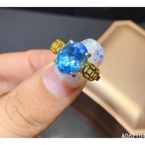 KJJEAXCMY fine jewelry 925 sterling silver inlaid natural Blue Topaz Womens lovely classic Patterns of ancient coins gem ring s
