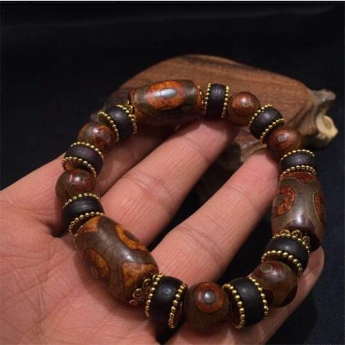 Tibets three-eyed pearls attract money, transfer pearls and hand string natural agate stone of the same kind for men and women