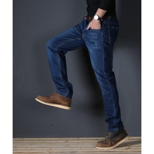 JS589J-2020 summer jeans mens straight fit large mid waist mens jeans elastic simple business pants