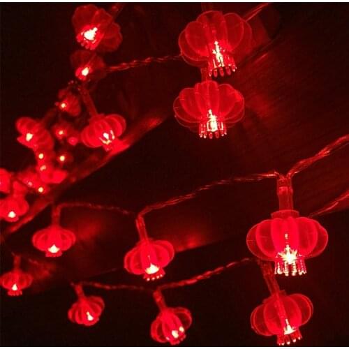 Spring Festival 2021 Red Lantern/Lantern Tassel/Carp/Peppers and Pinecone LED String Lighting with Pendant Outside in front of t