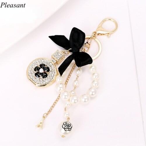 2021 New Creative Flower Keychain Pendant Bow Shape Alloy Keychain Pearl Bracelet Gift Wholesale