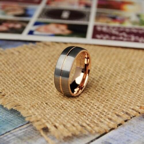 Popular 8 mm WC steel noble rose gold and silver glossy ring. The charm of men. Fashion trend engagement accessories