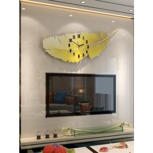 Nordic feather clock wall clock living room net red creative home fashion personality art decoration clock bells simple