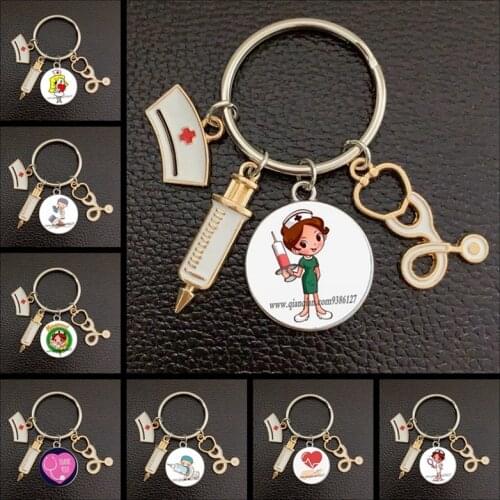 Creative doctor injection stethoscope picture keychain round dome pendant menand women fashionstethoscopesyringe alloy keychain