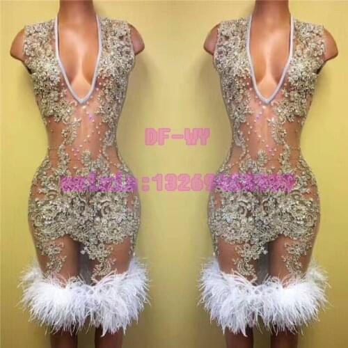 Female DJ sexy perspective skin colour rhinestone ostrich feather sleeveless dress skirt suit bars nightclubs holiday party stag