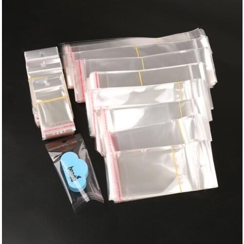 100pcs Transparent Self Adhesive Seal OPP Cellophane Bags Gift Bag Wedding Pouches Jewelry Packaging Bag With Hang Hole
