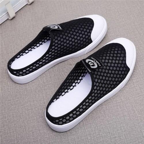 Slipper women wear 2021 new flat-bottomed net bread head lazy half-slippers hollow breathable small white shoes girl