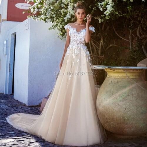 2020 Cap Sleeves A Line Wedding Dresses O Neck 3D Handmade Flowers Button Illusion Robe De Mariee Court Train Vestido De Noiva