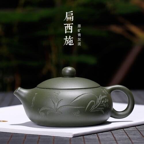 Yixing purple clay pot raw ore green mud flat Xishi hand engraved small and medium-sized bottle engraved orchid