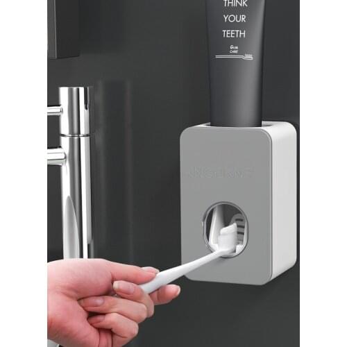 Automatic toothpaste squeezer set wall-mounted punch-free toothpaste toothbrush rack toothpaste rack lazy squeezer