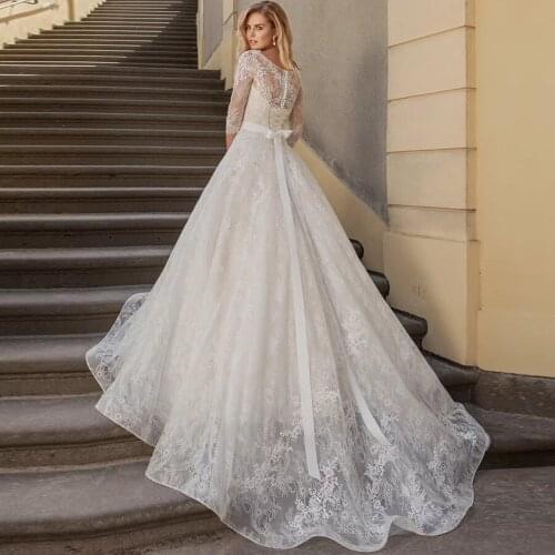 2020 Elegant Long Sleeves A-line Dubai Wedding Dresses Scoop Neck Lace Appliques Beaded Bridal Gowns Robe de Mariage