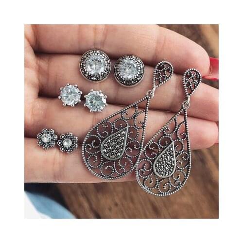 Hollow earring set with four pairs of zircon crystal earrings