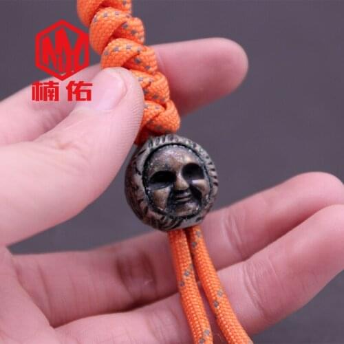 2019 Brass Oxide Bronze Knife Bead EDC Paracord Pendant Flashlight Evil Face Pendant
