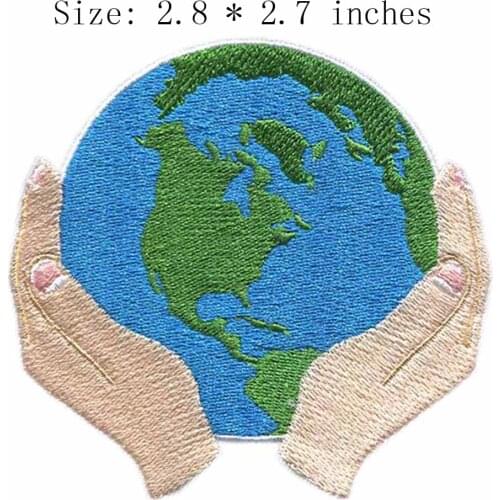 Hands and earth 2.8"wide embroidery patch for together/in a world/environment