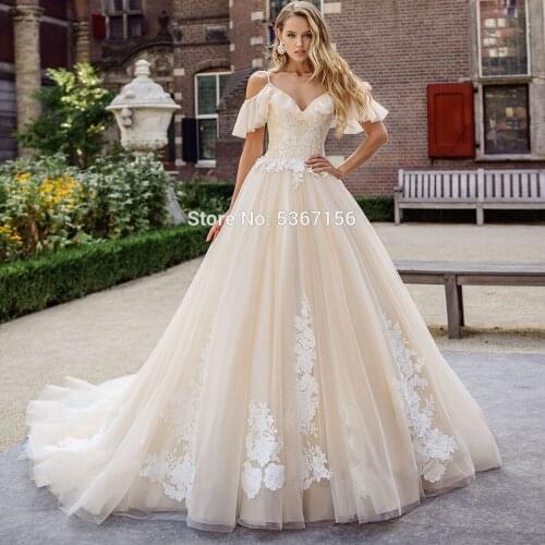 Luxury Champagne Wedding Dresses Off the Shoulder V Neck Beaded Straps Vestido De Noiva 2021 Ivory Appliques Lace Up Bridal Gown