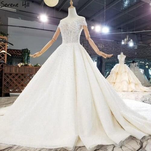 Dubai Ivory Sexy Short Sleeves Wedding Dresses 2020 Luxury Diamond Beading Lace Up Bridal Gowns HX0267 Custom Made
