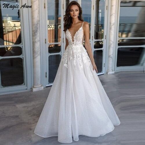 Magic Awn Glitter Princess Wedding Dresses Spaghetti Straps Lace Appliques Illusion Backless A-Line Modest Wedding Party Gowns