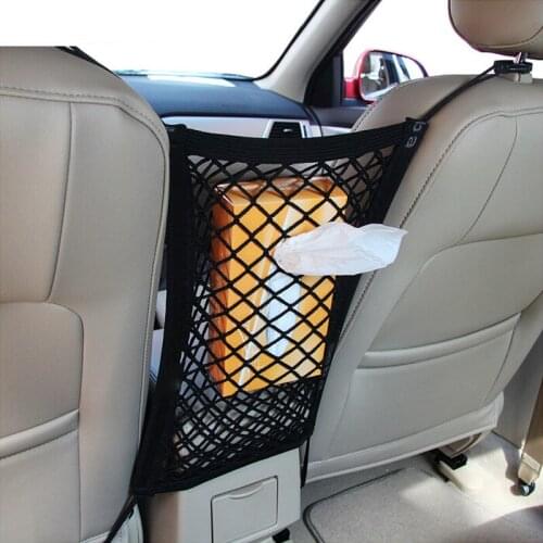 The car seat between the storage bag storage box luggage blocking vehicles with mobile phone net bag