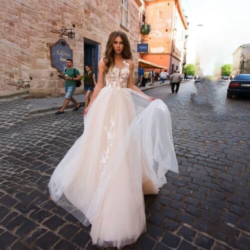Sheer Neck with Lace Applique Champagne A-line Wedding Dress Sexy Open Back robe de mariee princesse de luxe Bridal Dress