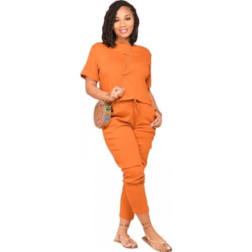 Ladies Trouser Suit Solid Color Round Neck Short-sleeved T-shirt + Casual Pants Two-piece Set 2021 Summer New African Clothing