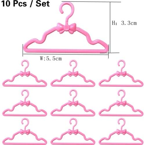 NK 10 Pcs/Lot Mini Doll Plastic Pink Hangers Cute Coat Pants Clothes Holder For Barbie Doll Accessories Baby Toys 03F 3X
