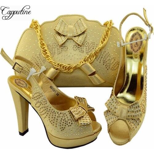 Capputine Women's Gold Bags