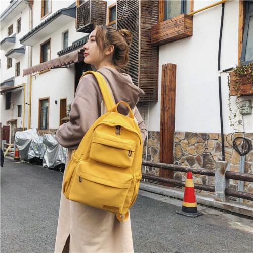 The new 2021 backpack student schoolbag female Korean version of large capacity travel leisure solid color multi-layer backpack
