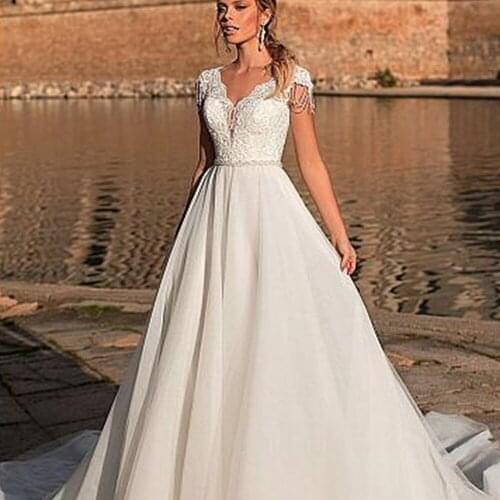 V-Neck Lace Appliques Beading Women Wedding Dresses See Througn Back Long Garden Bridal Gowns Custom Robe De Marriage Vestidos