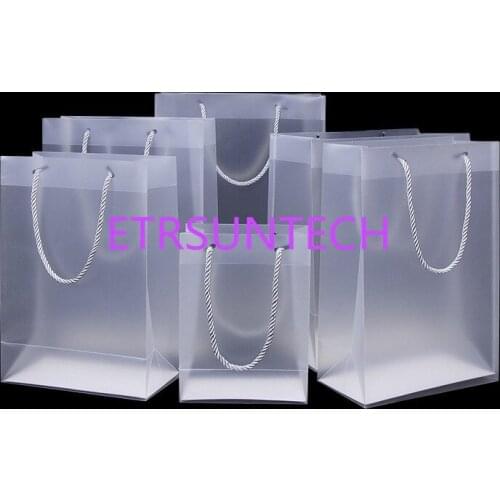100pcs new creative pp plastic gift packaging bags with handle wedding party favors bags portable plastic transparent gift bags