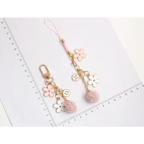 Style and Japanese Cherry Blossom Hollow Bell Mobile Phone Charm Wrist Strap Handbag Pendant Creative Girls Heart Gift