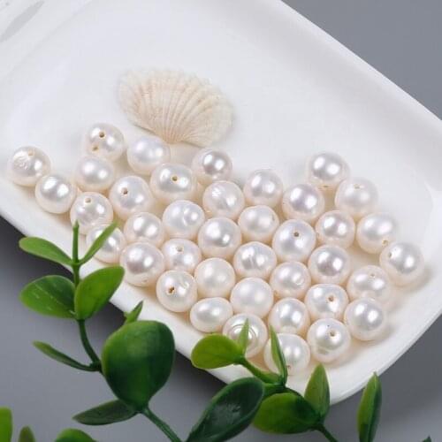 Wholesale 10-11mm white round freshwater loose pearls drilled hole for making pearl strands jewelry