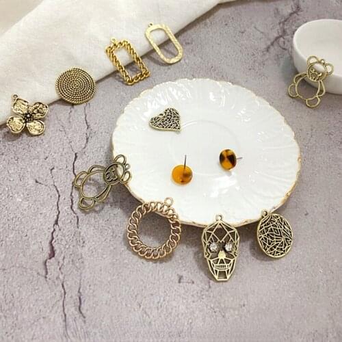 Retro alloy jewelry accessories old alloy skull flower geometric bear necklace bracelet mobile phone case pendant