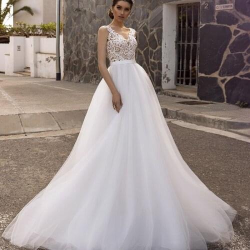 Sexy Beach Wedding Dress 2021 Sleeveless V Neck Long Bohemian Lace Tulle Bride Dresses A Line Brush Train