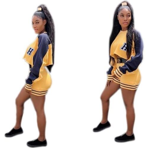 Sexy spring and summer two-piece womens fashion personality dark blue and yellow stitching long-sleeved shorts sports suit