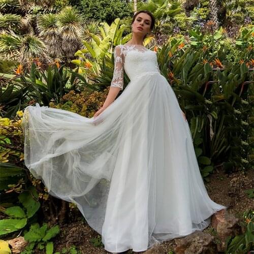 Magic Awn New Bohemian Lace Tulle Wedding Dresses Half Sleeve Appliques Illusion Princess Beach A-Line Bridal Gowns Robe Mariage