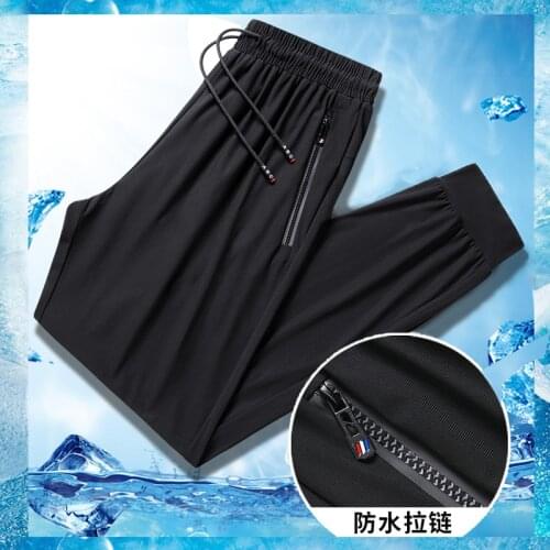 2021 new loose mouth ice silk trousers mens summer thin elastic trousers sports leisure trousers loose feet pants