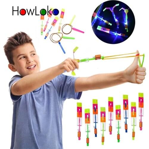 10PCS Outdoor Shining Rocket Flash LED Light Night Kids Luminous Slingshot Toys Shine Slingshot Elastic Helicopter Rotating Toy
