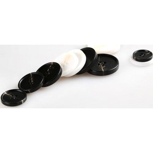 15-30mm Fine-edged resin imitation horn black and white stick flower buttons High-end suit matte spray paint horn pattern button